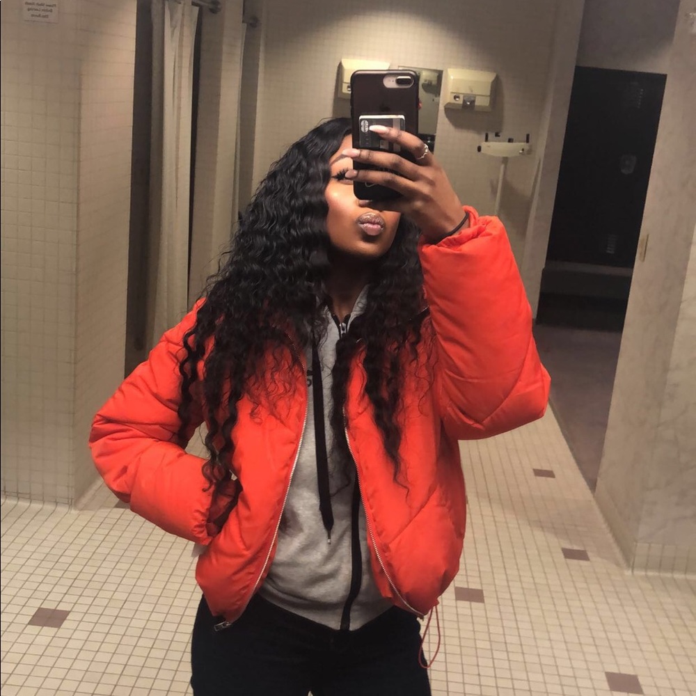 Orange puffy jacket